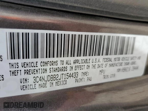 2018 Jeep Compass Latitude with VIN 3C4NJDBB2JT154433, listed as a Copart auction lot 52747205 with 141,930 mi miles and Salvage Title. Bid and sale history available at DreamBid. Image 13.
