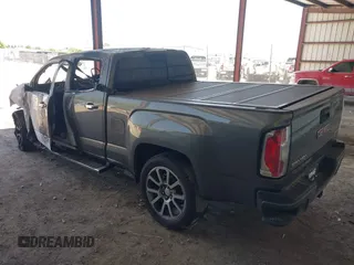 2017 GMC Canyon 4WD Denali z VIN 1GTG6EEN4H1237577, wystawiony jako IAAI lot #42261280 z przebiegiem Nie podano mil oraz . Historia ofert i sprzedaży dostępna na DreamBid. Obrazek 3.