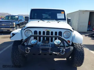 2012 Jeep Wrangler Unlimited Sahara with VIN 1C4BJWEG2CL117080, listed as a IAAI auction lot 41868590 with 92,475 mi miles. Bid and sale history available at carsss.com. Image 12.