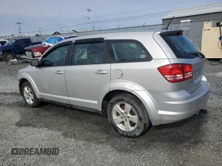 2013 Dodge Journey American Value z VIN 3C4PDCABXDT621551, wystawiony jako Copart lot #52523675 z przebiegiem 123 348 mil mil oraz Szkoda całkowita • Salvage title. Historia ofert i sprzedaży dostępna na DreamBid. Obrazek 2.
