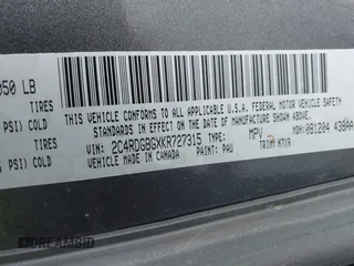 2019 Dodge Grand Caravan SE with VIN 2C4RDGBGXKR727315, listed as a IAAI auction lot 41770222 with 97,561 mi miles and . Bid and sale history available at DreamBid. Image 9.