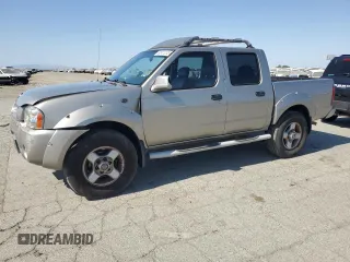2001 Nissan Frontier SE z VIN 1N6ED27TX1C333244, wystawiony jako Copart lot #59951235 z przebiegiem 191 537 mil mil oraz Czysty tytuł • Clean title. Historia ofert i sprzedaży dostępna na DreamBid. Obrazek 1.