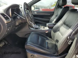 2016 Jeep Grand Cherokee Limited 75th Anniversary with VIN 1C4RJFBG3GC303588, listed as a Copart auction lot 53254915 with 130,660 mi miles and Salvage Title. Bid and sale history available at DreamBid. Image 7.
