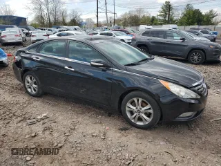 2013 Hyundai Sonata Limited with VIN 5NPEC4AC1DH674549, listed as a Copart auction lot 53017565 with 128,978 mi miles and Salvage Title. Bid and sale history available at carsss.com. Image 4.