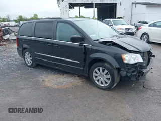 2014 Chrysler Town & Country Touring z VIN 2C4RC1BG3ER317203, wystawiony jako IAAI lot #42375862 z przebiegiem 92 894 mil mil oraz . Historia ofert i sprzedaży dostępna na DreamBid. Obrazek 1.
