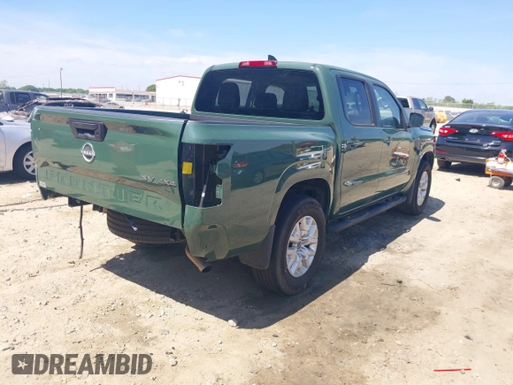 2022 Nissan Frontier SV with VIN 1N6ED1EK1NN695199, listed as a IAAI auction lot 42085368 with 30,481 mi miles and . Bid and sale history available at DreamBid. Image 4.