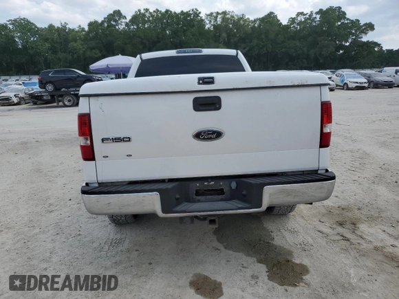 2005 Ford F-150 STX with VIN 1FTRX14W35FB76018, listed as a Copart auction lot 54075785 with 209,176 mi miles and Salvage Title. Bid and sale history available at carsss.com. Image 6.