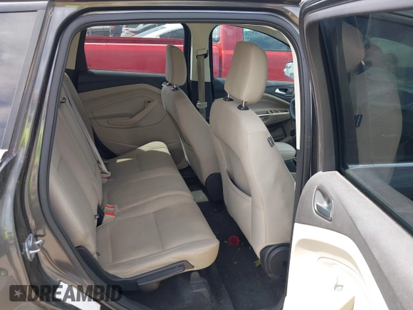 2018 Ford Escape SE z VIN 1FMCU9G98JUC13620, wystawiony jako IAAI lot #42011272 z przebiegiem 71 677 mil mil oraz . Historia ofert i sprzedaży dostępna na DreamBid. Obrazek 8.