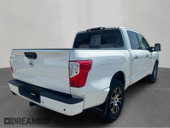 2020 Nissan Titan with VIN 1N6AA1ED8LN5011, listed as a Copart auction lot 67142895 with 132,686 mi miles and Clean title. Bid and sale history available at DreamBid. Image 4.