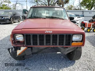 1998 Jeep Cherokee Sport with VIN 1J4FT68S4WL270134, listed as a Copart auction lot 51019695 with 246,945 mi miles and Non Repairable. Bid and sale history available at carsss.com. Image 5.