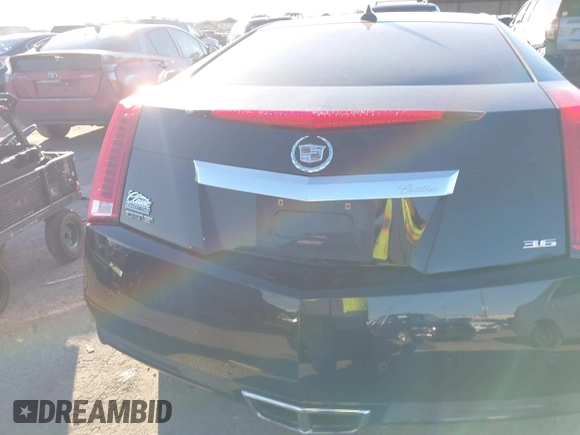 2011 Cadillac CTS Performance with VIN 1G6DK1ED9B0130927, listed as a IAAI auction lot 41414803 with 147,299 mi miles and . Bid and sale history available at DreamBid. Image 16.