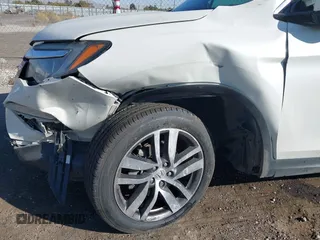 2017 Honda Pilot Elite with VIN 5FNYF6H02HB042160, listed as a IAAI auction lot 40893685 with Not Provided miles and . Bid and sale history available at DreamBid. Image 6.