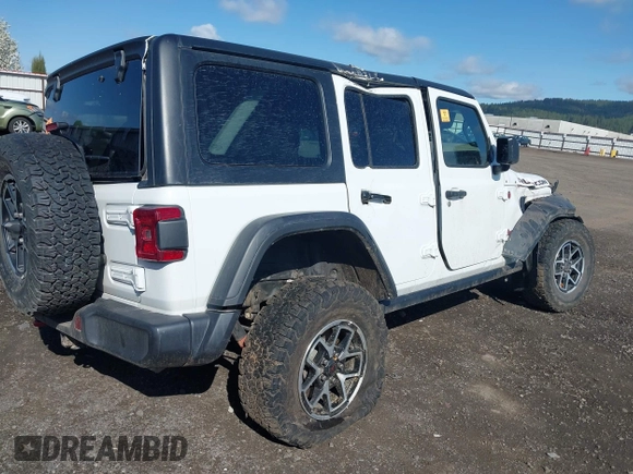 2024 Jeep Wrangler Rubicon with VIN 1C4PJXFG9RW307699, listed as a IAAI auction lot 42047562 with Not Provided miles. Bid and sale history available at carsss.com. Image 4.