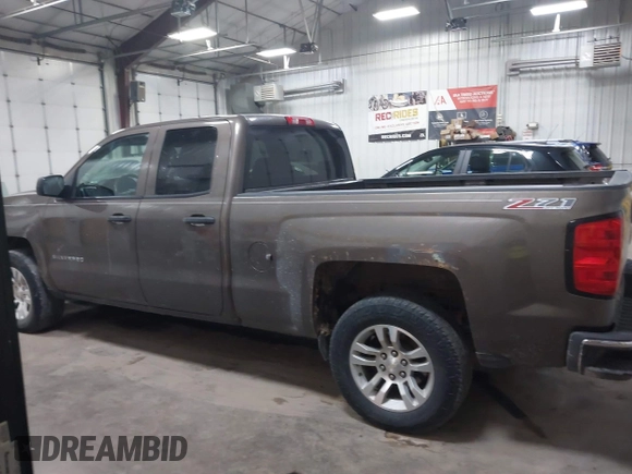 2014 Chevrolet Silverado 1500 LT with VIN 1GCVKREC9EZ240612, listed as a IAAI auction lot 41108566 with 200,625 mi miles and . Bid and sale history available at DreamBid. Image 15.