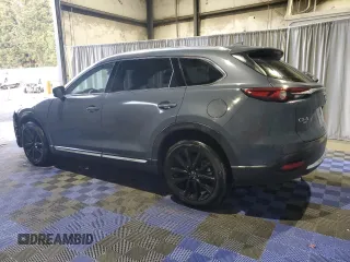 2023 Mazda CX-9 Carbon Edition z VIN JM3TCBDY0P0645880, wystawiony jako Copart lot #81275354 z przebiegiem 16 781 mil mil oraz Szkoda całkowita • Salvage title. Historia ofert i sprzedaży dostępna na DreamBid. Obrazek 2.