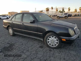 1998 Mercedes-Benz E 320 with VIN WDBJF25F4WA625790, listed as a Copart auction lot 87920735 with 179,382 mi miles and Clean Title. Bid and sale history available at DreamBid. Image 4.