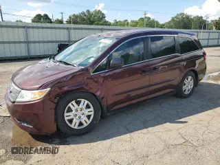 2011 Honda Odyssey LX with VIN 5FNRL5H21BB007612, listed as a Copart auction lot 64691775 with 216,225 mi miles and Salvage title. Bid and sale history available at DreamBid. Image 1.