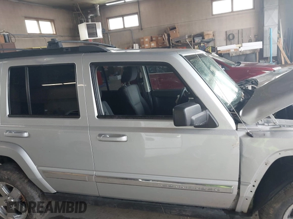 2010 Jeep Commander Sport z VIN 1J4RG4GK0AC105228, wystawiony jako IAAI lot #42558376 z przebiegiem Nie podano mil oraz . Historia ofert i sprzedaży dostępna na DreamBid. Obrazek 14.