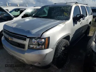 2010 Chevrolet Suburban LT with VIN 1GNUCJE08AR133956, listed as a Copart auction lot 76145714 with 212,459 mi miles and Salvage Title. Bid and sale history available at carsss.com. Image 1.