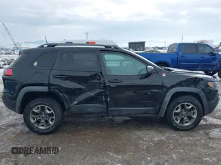 2019 Jeep Cherokee Trailhawk Elite with VIN 1C4PJMBX6KD313675, listed as a IAAI auction lot 41448924 with 51,639 mi miles. Bid and sale history available at carsss.com. Image 13.