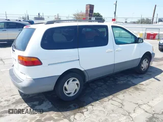 1998 Toyota Sienna LE with VIN 4T3ZF13C2WU066460, listed as a IAAI auction lot 42088006 with 169,014 mi miles and . Bid and sale history available at DreamBid. Image 4.