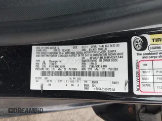 2011 Ford Fiesta SE with VIN 3FADP4BJ5BM221349, listed as a IAAI auction lot 41948737 with 216,540 mi miles. Bid and sale history available at carsss.com. Image 9.