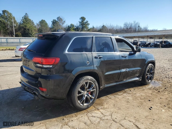 2015 Jeep Grand Cherokee SRT with VIN 1C4RJFDJ1FC663370, listed as a Copart auction lot 86608514 with 123,209 mi miles and Salvage Title. Bid and sale history available at carsss.com. Image 3.