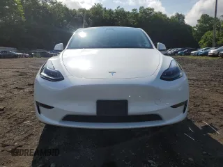 2024 Tesla Model Y Long Range с VIN 7SAYGDEE1RF201627, выставлен на аукционе Copart как лот 60631195 с пробегом 14 356 миль миль и Списание • Salvage title. История ставок и продаж доступна на DreamBid. Изображение 5.