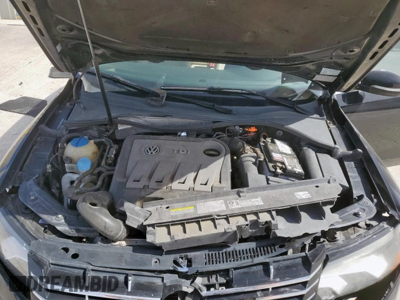2014 Volkswagen Passat SE z VIN 1VWBN7A35EC066557, wystawiony jako Copart lot #57065545 z przebiegiem 112 154 mil mil oraz Szkoda całkowita • Salvage title. Historia ofert i sprzedaży dostępna na DreamBid. Obrazek 11.