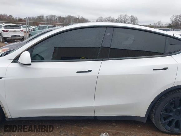 2021 Tesla Model Y Standard Range with VIN 5YJYGDED8MF114076, listed as a IAAI auction lot 41567295 with 150,133 mi miles and . Bid and sale history available at DreamBid. Image 13.