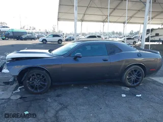 2021 Dodge Challenger GT with VIN 2C3CDZKG4MH677574, listed as a IAAI auction lot 41460036 with 67,170 mi miles. Bid and sale history available at carsss.com. Image 13.