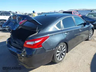 2017 Nissan Altima 2.5 SV with VIN 1N4AL3AP0HC277398, listed as a IAAI auction lot 40918944 with 214,412 mi miles. Bid and sale history available at carsss.com. Image 4.