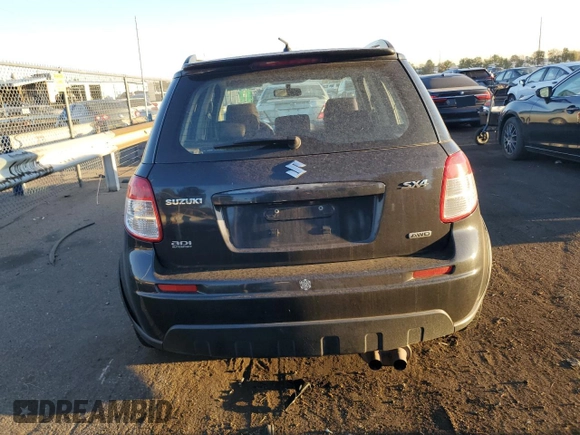 2009 Suzuki SX4 Man Touring Pkg AWD with VIN JS2YB417195101117, listed as a Copart auction lot 71102744 with 137,707 mi miles and Salvage Title. Bid and sale history available at carsss.com. Image 6.
