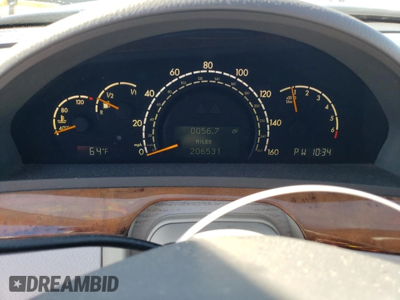 2002 Mercedes-Benz S-Class 5.0L with VIN WDBNG75JX2A306811, listed as a Copart auction lot 52042105 with 206,531 mi miles and Salvage Title. Bid and sale history available at carsss.com. Image 9.