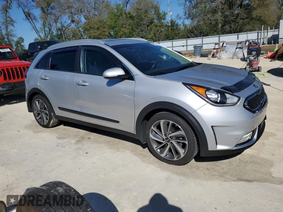 2019 Kia Niro Touring with VIN KNDCE3LC4K5215974, listed as a Copart auction lot 48774205 with 59,080 mi miles and Non Repairable. Bid and sale history available at carsss.com. Image 4.