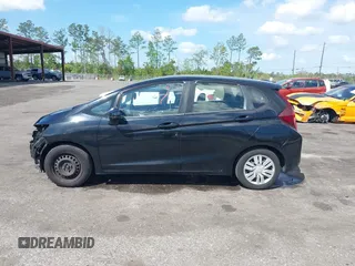 2016 Honda Fit LX with VIN JHMGK5H57GS010902, listed as a IAAI auction lot 41902395 with 124,531 mi miles. Bid and sale history available at carsss.com. Image 15.
