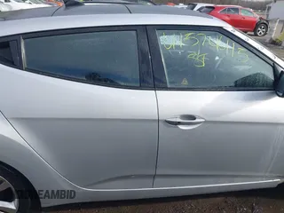 2017 Hyundai Veloster with VIN KMHTC6AD2HU324740, listed as a IAAI auction lot 41574415 with 66,685 mi miles. Bid and sale history available at carsss.com. Image 14.