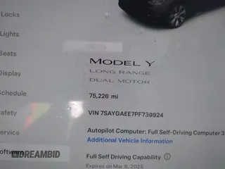 2023 Tesla Model Y Long Range with VIN 7SAYGAEE7PF739924, listed as a IAAI auction lot 41612323 with 75,226 mi miles and . Bid and sale history available at DreamBid. Image 14.