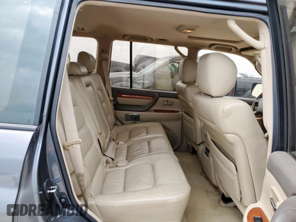 2003 Lexus LX 470 z VIN JTJHT00W033530306, wystawiony jako Copart lot #57162675 z przebiegiem 185 458 mil mil oraz Szkoda całkowita • Salvage title. Historia ofert i sprzedaży dostępna na DreamBid. Obrazek 11.