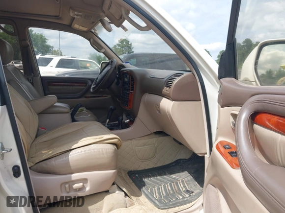 1999 Lexus LX 470 with VIN JT6HT00W5X0065846, listed as a IAAI auction lot 42142816 with 288,854 mi miles and . Bid and sale history available at DreamBid. Image 5.