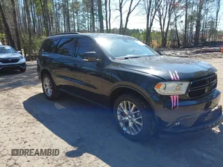 2016 Dodge Durango Limited with VIN 1C4RDJDG5GC302241, listed as a IAAI auction lot 41877415 with 135,586 mi miles and . Bid and sale history available at DreamBid. Image 1.