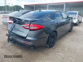 2019 Ford Fusion SE with VIN 3FA6P0HD7KR169700, listed as a IAAI auction lot 42064494 with 56,463 mi miles and . Bid and sale history available at DreamBid. Image 4.