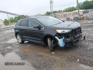2021 Ford Edge Titanium with VIN 2FMPK4K91MBA10290, listed as a IAAI auction lot 42350622 with 64,365 mi miles and . Bid and sale history available at DreamBid. Image 1.