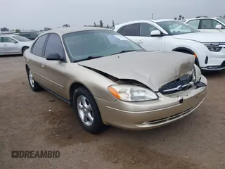 2001 Ford Taurus SES z VIN 1FAFP55U51G164342, wystawiony jako IAAI lot #42472594 z przebiegiem 140 802 mil mil oraz . Historia ofert i sprzedaży dostępna na DreamBid. Obrazek 1.