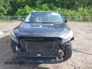 2016 Kia Sorento EX with VIN 5XYPHDA5XGG083093, listed as a IAAI auction lot 42138707 with 156,799 mi miles and . Bid and sale history available at DreamBid. Image 13.