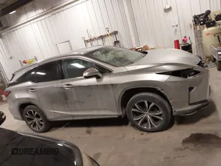 2018 Lexus RX 350L Premium z VIN JTJDZKCA6J2004385, wystawiony jako IAAI lot #41382429 z przebiegiem 111 638 mil mil oraz . Historia ofert i sprzedaży dostępna na DreamBid. Obrazek 14.