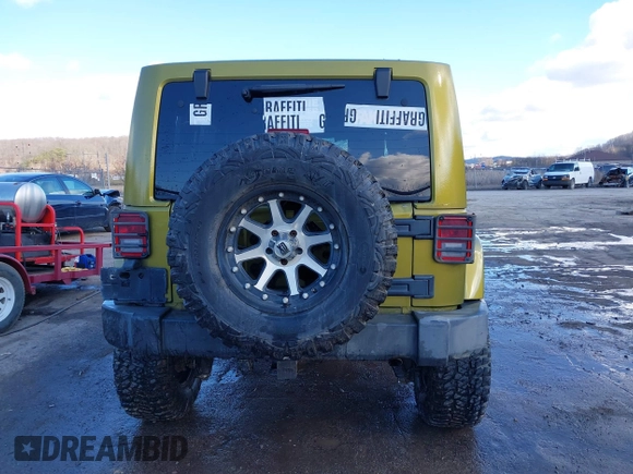 2007 Jeep Wrangler Unlimited Sahara with VIN 1J4GA59187L189519, listed as a IAAI auction lot 41204036 with 165,428 mi miles and . Bid and sale history available at DreamBid. Image 16.
