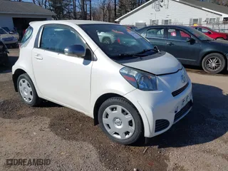 2012 Scion iQ with VIN JTNJJXB08CJ011734, listed as a IAAI auction lot 41769409 with 75,931 mi miles. Bid and sale history available at carsss.com. Image 1.