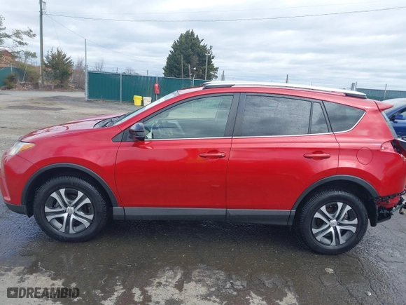 2016 Toyota RAV4 LE with VIN JTMBFREV2GJ097058, listed as a IAAI auction lot 41720372 with 118,606 mi miles. Bid and sale history available at carsss.com. Image 15.
