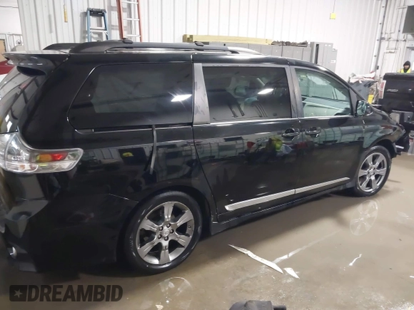 2011 Toyota Sienna SE with VIN 5TDXK3DCXBS067929, listed as a IAAI auction lot 41552044 with 203,697 mi miles. Bid and sale history available at carsss.com. Image 14.
